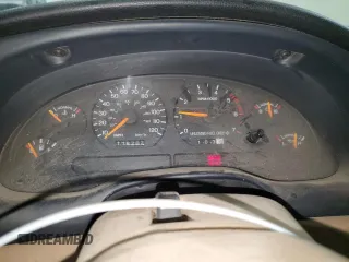 1996 Ford Mustang with VIN 1FALP4045TF168100, listed as a Copart auction lot 60464845 with 116,702 mi miles and Salvage title. Bid and sale history available at DreamBid. Image 9.