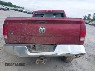 2014 Ram 1500 SLT z VIN 1C6RR6GT6ES408358, wystawiony jako IAAI lot #42038597 z przebiegiem Nie podano mil oraz . Historia ofert i sprzedaży dostępna na DreamBid. Obrazek 16.