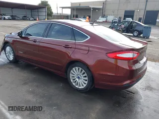 2015 Ford Fusion SE Hybrid with VIN 3FA6P0LU8FR172313, listed as a IAAI auction lot 41556556 with 152,567 mi miles. Bid and sale history available at carsss.com. Image 3.