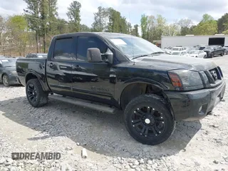 2009 Nissan Titan LE with VIN 1N6BA07D79N317253, listed as a IAAI auction lot 41944642 with 231,896 mi miles. Bid and sale history available at carsss.com. Image 13.
