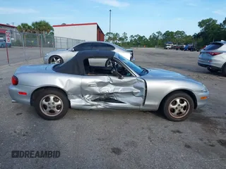 1999 Mazda MX-5 Miata with VIN JM1NB3534X0124237, listed as a IAAI auction lot 42536654 with 92,696 mi miles and . Bid and sale history available at DreamBid. Image 14.