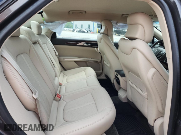 2016 Lincoln MKZ z VIN 3LN6L2G94GR613505, wystawiony jako Copart lot #60842925 z przebiegiem 55 154 mil mil oraz Szkoda całkowita • Salvage title. Historia ofert i sprzedaży dostępna na DreamBid. Obrazek 10.