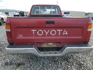 1992 Toyota Pickup DLX z VIN JT4RN93P1N5052818, wystawiony jako Copart lot #77344244 z przebiegiem 484 357 mil mil oraz Szkoda całkowita • Salvage title. Historia ofert i sprzedaży dostępna na DreamBid. Obrazek 6.