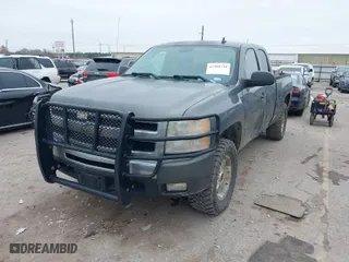 2011 Chevrolet Silverado 1500 LT with VIN 1GCRKSE3XBZ236735, listed as a IAAI auction lot 41580718 with 153,160 mi miles. Bid and sale history available at carsss.com. Image 2.