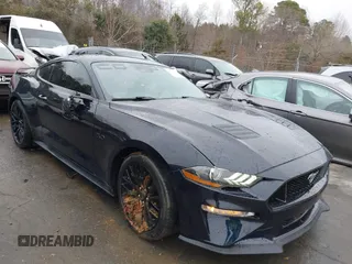 2021 Ford Mustang GT with VIN 1FA6P8CFXM5106832, listed as a IAAI auction lot 41512413 with 22,171 mi miles. Bid and sale history available at carsss.com. Image 1.