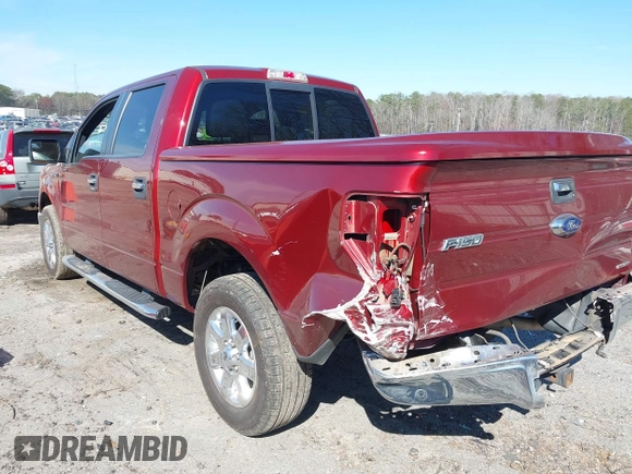 2014 Ford F-150 XL with VIN 1FTFW1CF2EKD08667, listed as a IAAI auction lot 41705412 with 129,817 mi miles. Bid and sale history available at carsss.com. Image 3.