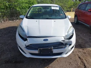 2019 Ford Fiesta SE z VIN 3FADP4BJ9KM136689, wystawiony jako IAAI lot #42095835 z przebiegiem 80 856 mil mil oraz . Historia ofert i sprzedaży dostępna na DreamBid. Obrazek 11.