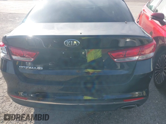 2016 Kia Optima LX with VIN 5XXGT4L31GG022844, listed as a IAAI auction lot 41240100 with 121,586 mi miles and . Bid and sale history available at DreamBid. Image 16.