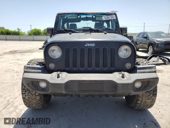 2015 Jeep Wrangler Sport with VIN 1C4GJWAG8FL563198, listed as a Copart auction lot 52867385 with 47,854 mi miles and Salvage title. Bid and sale history available at DreamBid. Image 5.