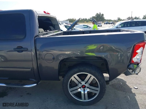 2011 Chevrolet Silverado 1500 LS with VIN 3GCPCREA2BG299534, listed as a IAAI auction lot 40703559 with 148,717 mi miles. Bid and sale history available at carsss.com. Image 18.