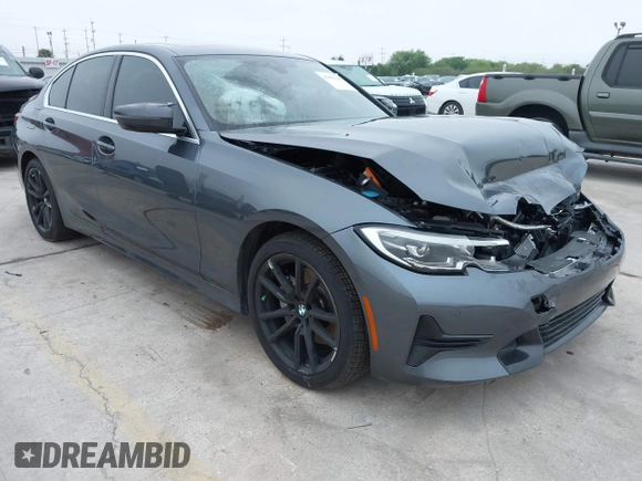 2021 BMW 3 Series 330i with VIN 3MW5R1J09M8C15403, listed as a IAAI auction lot 41892341 with 30,975 mi miles and . Bid and sale history available at carsss.com. Image 1.