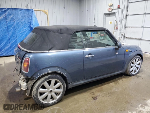 2009 MINI Convertible z VIN WMWMR335X9TJ93685, wystawiony jako Copart lot #50899755 z przebiegiem 123 609 mil mil oraz Szkoda całkowita • Salvage title. Historia ofert i sprzedaży dostępna na DreamBid. Obrazek 3.