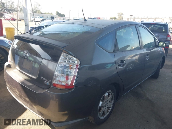 2007 Toyota Prius z VIN JTDKB20U873226409, wystawiony jako IAAI lot #42541909 z przebiegiem 128 374 mil mil oraz . Historia ofert i sprzedaży dostępna na DreamBid. Obrazek 4.