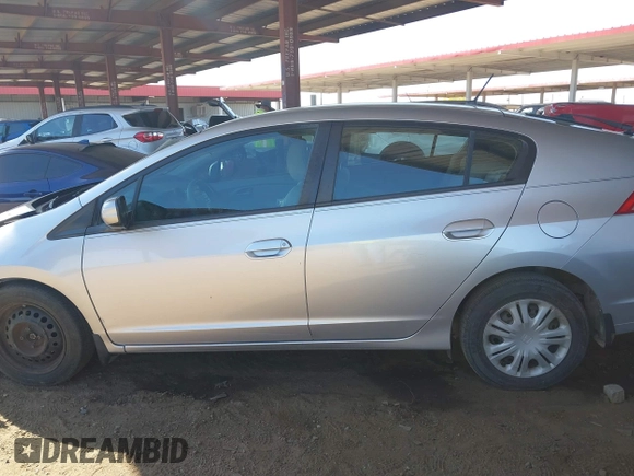 2010 Honda Insight LX z VIN JHMZE2H53AS007016, wystawiony jako IAAI lot #42096274 z przebiegiem 173 519 mil mil oraz . Historia ofert i sprzedaży dostępna na DreamBid. Obrazek 14.