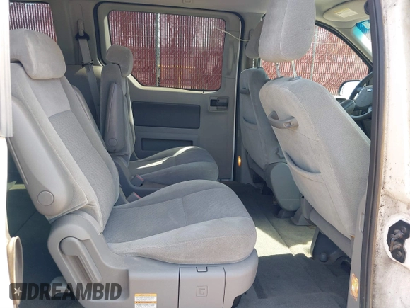 2006 Ford Freestar SEL z VIN 2FMZA52296BA23814, wystawiony jako IAAI lot #41791434 z przebiegiem 132 850 mil mil oraz . Historia ofert i sprzedaży dostępna na DreamBid. Obrazek 8.