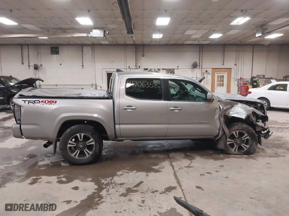 2018 Toyota Tacoma SR with VIN 3TMCZ5AN1JM149820, listed as a IAAI auction lot 41706358 with NaN miles. Bid and sale history available at carsss.com. Image 13.