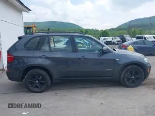 2013 BMW X5 xDrive35i z VIN 5UXZV4C50D0B01294, wystawiony jako IAAI lot #42280518 z przebiegiem 91 804 mil mil oraz . Historia ofert i sprzedaży dostępna na DreamBid. Obrazek 13.