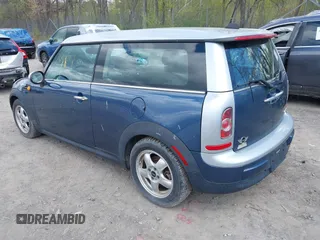 2011 MINI Clubman with VIN WMWZF3C57BTX81693, listed as a IAAI auction lot 42188813 with 86,533 mi miles and . Bid and sale history available at DreamBid. Image 3.
