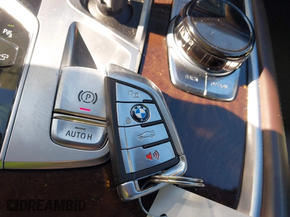2017 BMW 7 Series 750i with VIN WBA7F0C34HGM21738, listed as a IAAI auction lot 41772933 with 62,923 mi miles and . Bid and sale history available at DreamBid. Image 11.