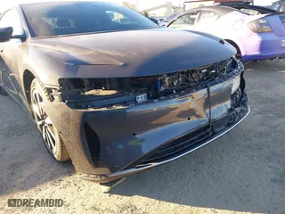 2023 Lucid Air Touring with VIN 50EA1TEA1PA002151, listed as a IAAI auction lot 41219565 with 8,215 mi miles. Bid and sale history available at carsss.com. Image 6.