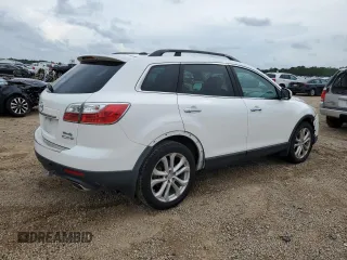 2012 Mazda CX-9 Grand Touring z VIN JM3TB2DA7C0358374, wystawiony jako Copart lot #58741885 z przebiegiem 127 162 mil mil oraz Czysty tytuł • Clean title. Historia ofert i sprzedaży dostępna na DreamBid. Obrazek 3.