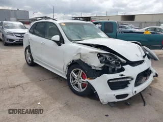 2013 Porsche Cayenne GTS with VIN WP1AD2A29DLA79210, listed as a IAAI auction lot 41444817 with 60,553 mi miles and . Bid and sale history available at DreamBid. Image 1.