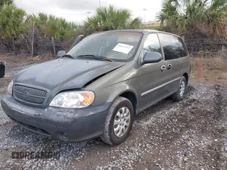 2004 Kia Sedona LX with VIN KNDUP131346533373, listed as a IAAI auction lot 41632342 with 76,545 mi miles. Bid and sale history available at carsss.com. Image 2.