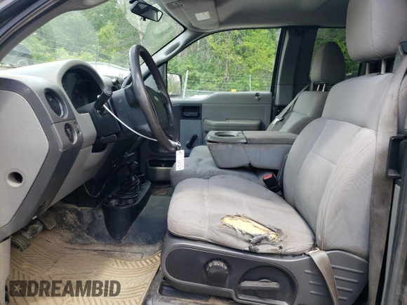 2006 Ford F-150 STX with VIN 1FTRX14W36NB54625, listed as a Copart auction lot 58221215 with 219,195 mi miles and Salvage title. Bid and sale history available at DreamBid. Image 7.