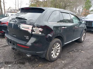 2011 Lincoln MKX with VIN 2LMDJ8JKXBBJ31869, listed as a IAAI auction lot 41710747 with 191,698 mi miles. Bid and sale history available at carsss.com. Image 4.