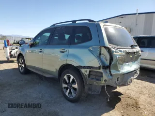 2018 Subaru Forester Premium with VIN JF2SJAGC8JH438474, listed as a Copart auction lot 53691275 with 63,404 mi miles and Salvage Title. Bid and sale history available at DreamBid. Image 2.