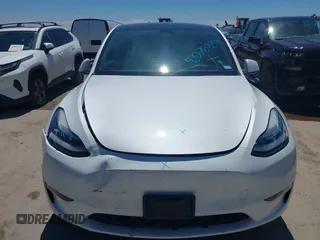 2022 Tesla Model Y Long Range z VIN 7SAYGDEE3NF426481, wystawiony jako IAAI lot #42076729 z przebiegiem 21 648 mil mil oraz . Historia ofert i sprzedaży dostępna na DreamBid. Obrazek 12.