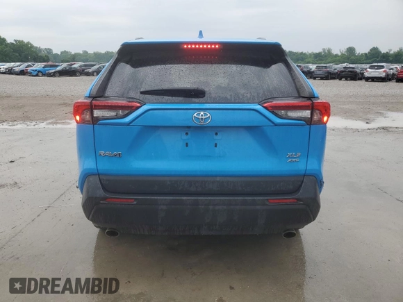2021 Toyota RAV4 XLE with VIN 2T3P1RFV2MC142047, listed as a Copart auction lot 59095105 with 90,624 mi miles and Salvage title. Bid and sale history available at DreamBid. Image 6.