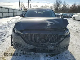 2021 Mazda CX-5 Grand Touring with VIN JM3KFBDM5M1456650, listed as a Copart auction lot 42124045 with 45,205 mi miles and Salvage Title. Bid and sale history available at carsss.com. Image 5.