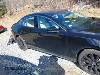 2023 Mazda 3 Premium Plus with VIN 3MZBPBEY9PM385318, listed as a IAAI auction lot 41882334 with 10,582 mi miles and . Bid and sale history available at DreamBid. Image 13.
