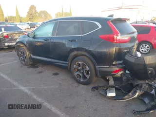 2019 Honda CR-V Touring with VIN 7FARW2H9XKE012394, listed as a IAAI auction lot 41092564 with 49,527 mi miles and . Bid and sale history available at DreamBid. Image 3.