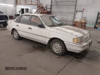 1992 Ford Tempo GL z VIN 2FAPP36X0NB187462, wystawiony jako IAAI lot #41771165 z przebiegiem 270 021 mil mil oraz . Historia ofert i sprzedaży dostępna na DreamBid. Obrazek 1.