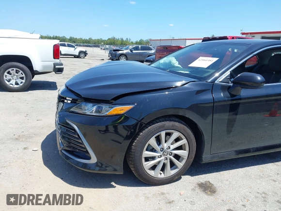 2023 Toyota Camry LE z VIN 4T1C11AK2PU120803, wystawiony jako IAAI lot #42060384 z przebiegiem 38 897 mil mil oraz . Historia ofert i sprzedaży dostępna na DreamBid. Obrazek 6.