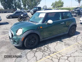 2013 MINI Hardtop with VIN WMWSU3C58DT545046, listed as a IAAI auction lot 42665896 with 60,973 mi miles and . Bid and sale history available at DreamBid. Image 2.