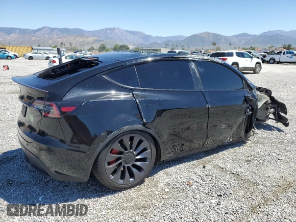 2022 Tesla Model Y Performance z VIN 7SAYGDEF0NF540933, wystawiony jako Copart lot #56087145 z przebiegiem 59 717 mil mil oraz Szkoda całkowita • Salvage title. Historia ofert i sprzedaży dostępna na DreamBid. Obrazek 3.