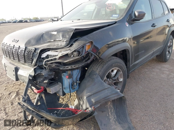 2019 Jeep Cherokee Trailhawk Elite with VIN 1C4PJMBX4KD385796, listed as a IAAI auction lot 41557577 with 55,700 mi miles. Bid and sale history available at carsss.com. Image 6.