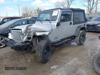2005 Jeep Wrangler Unlimited with VIN 1J4FA44S25P340852, listed as a IAAI auction lot 41441671 with 139,302 mi miles. Bid and sale history available at carsss.com. Image 17.