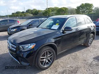 2019 Mercedes-Benz GLC with VIN WDC0G4JB3KV145553, listed as a IAAI auction lot 41957373 with 83,918 mi miles. Bid and sale history available at carsss.com. Image 2.