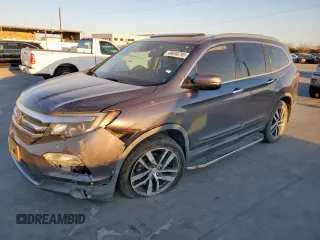2017 Honda Pilot Touring with VIN 5FNYF5H96HB013818, listed as a Copart auction lot 49850795 with Not provided miles and Salvage title. Bid and sale history available at DreamBid. Image 1.
