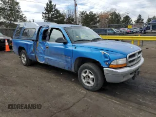 1999 Dodge Dakota SLT with VIN 1B7GL22X6XS298290, listed as a Copart auction lot 88682545 with 176,280 mi miles and Salvage Title. Bid and sale history available at carsss.com. Image 4.