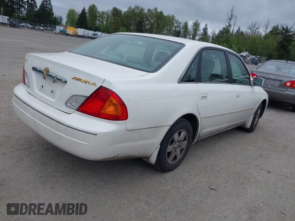 2002 Toyota Avalon XL with VIN 4T1BF28B82U239876, listed as a IAAI auction lot 42142686 with 104,163 mi miles and . Bid and sale history available at DreamBid. Image 4.