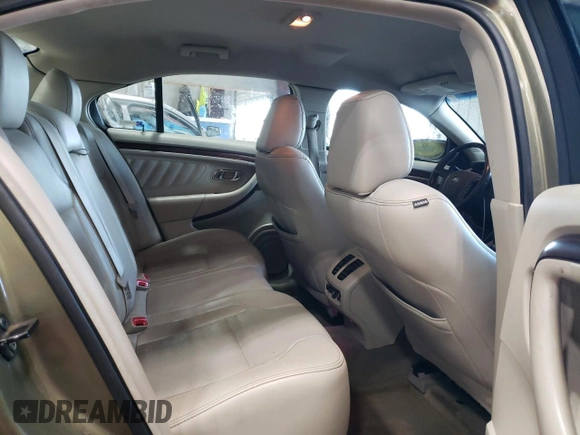 2012 Ford Taurus Limited with VIN 1FAHP2JW3CG142762, listed as a Copart auction lot 77864584 with 131,911 mi miles and Salvage title. Bid and sale history available at DreamBid. Image 10.