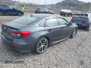 2022 Honda Civic Sedan Touring with VIN 2HGFE1F9XNH316999, listed as a IAAI auction lot 41994799 with 39,675 mi miles. Bid and sale history available at carsss.com. Image 4.