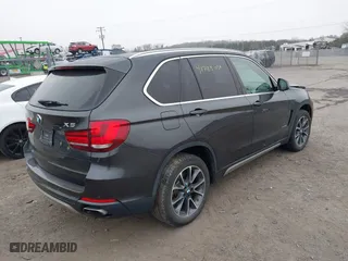 2018 BMW X5 xDrive35i with VIN 5UXKR0C58J0X86622, listed as a IAAI auction lot 41785054 with 89,540 mi miles. Bid and sale history available at carsss.com. Image 4.