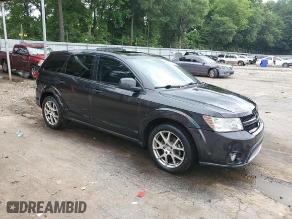 2013 Dodge Journey R/T with VIN 3C4PDDEG7DT677135, listed as a Copart auction lot 60256295 with 190,387 mi miles and Salvage title. Bid and sale history available at DreamBid. Image 4.