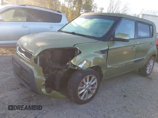2012 Kia Soul + with VIN KNDJT2A60C7435431, listed as a IAAI auction lot 41825391 with 91,692 mi miles. Bid and sale history available at carsss.com. Image 2.